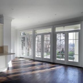Three stylish French doors featured in a newly renovated home.