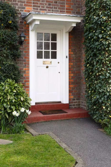 Front door and garden of a house located in a suburb of London