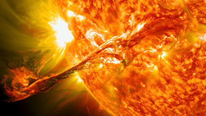 A coronal mass ejection blasts from the Sun's surface.