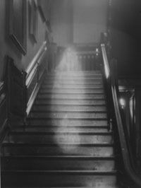 The 'Brown Lady' making her way down the staircase at Raynham Hall in Norfolk, England.