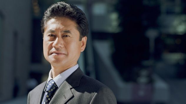 Neutral-Faced Asian Man