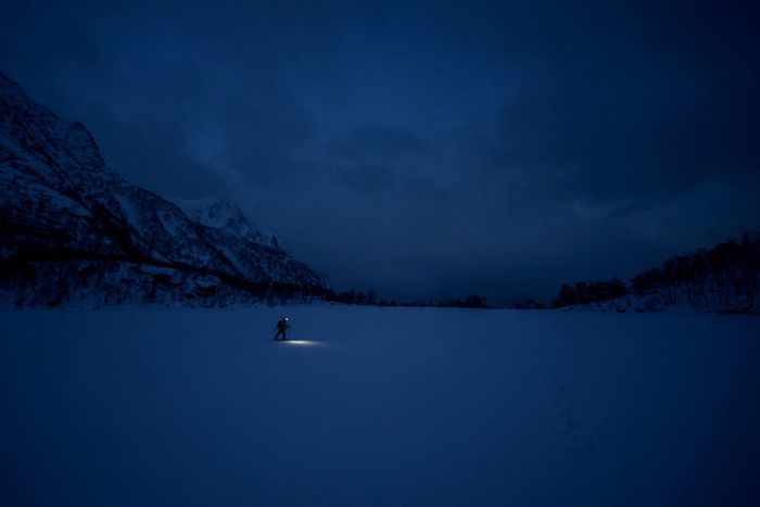 A person in the Arctic Night of Norway