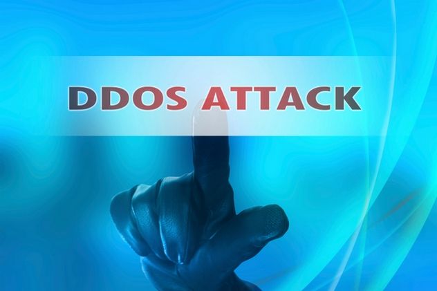 Online distributed denial services attack  concept with hand wea