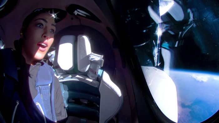 Kellie Gerardi aboard a spacecraft.