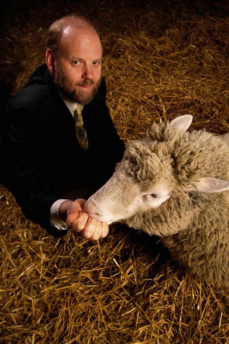 Ian Wilmut feeding Dolly the cloned sheep