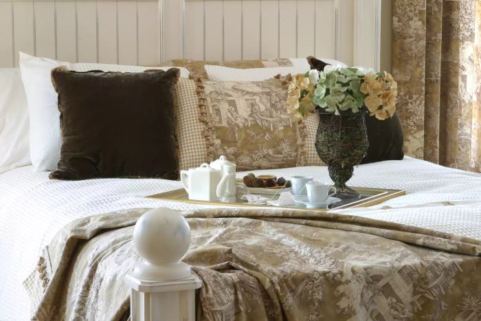 French country-style decorated bed
