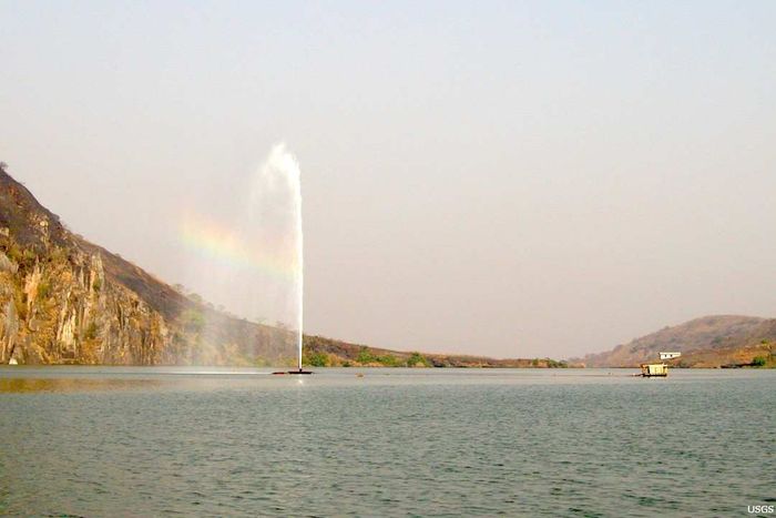 During the degassing process, a fountain of water enriched with carbon dioxide erupts from the depths of Lake Nyos.