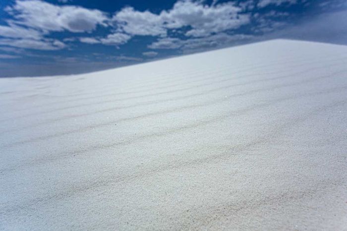 A white gypsum sand dune at White Sands National Park.