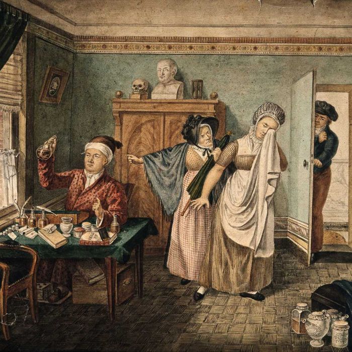 A doctor examining urine to determine a woman’s pregnancy.