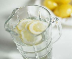 A pitcher of lemon water.