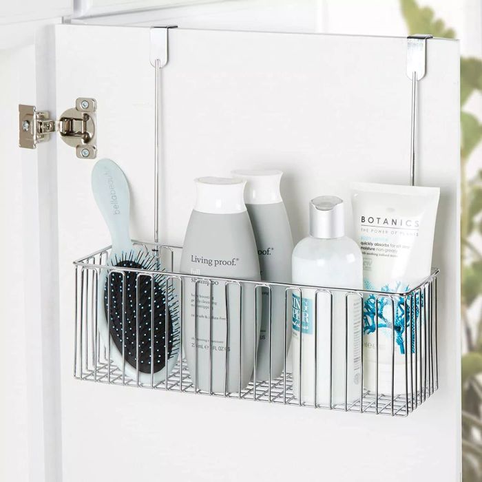 Over-the-door baskets are a favorite of Jonkoff's for organizing bulky items like hair dryers that are difficult to stack or fit into drawers. “These baskets are super convenient and prevent the cords from getting tangled,” she explains.