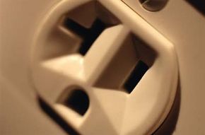 A close-up view of an electrical outlet.