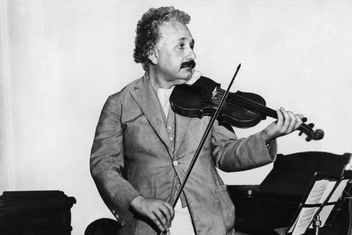 Albert Einstein playing the violin.