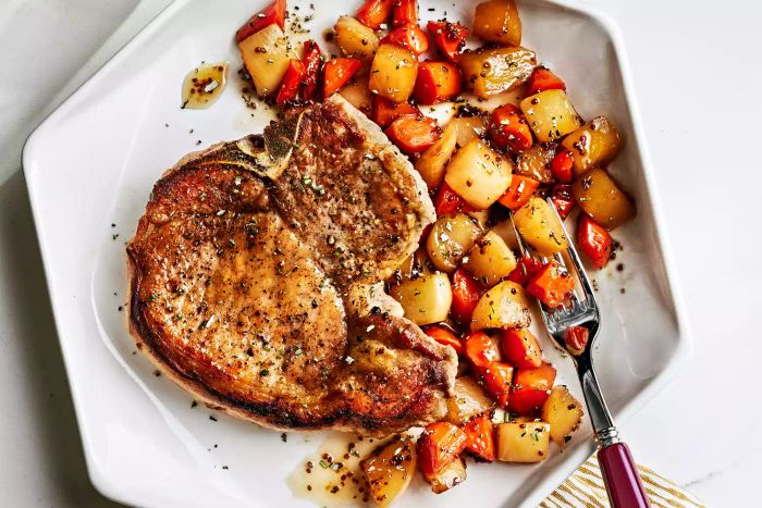 Delicious sweet and sour glazed pork chops served alongside turnips and carrots for a perfect combination.
