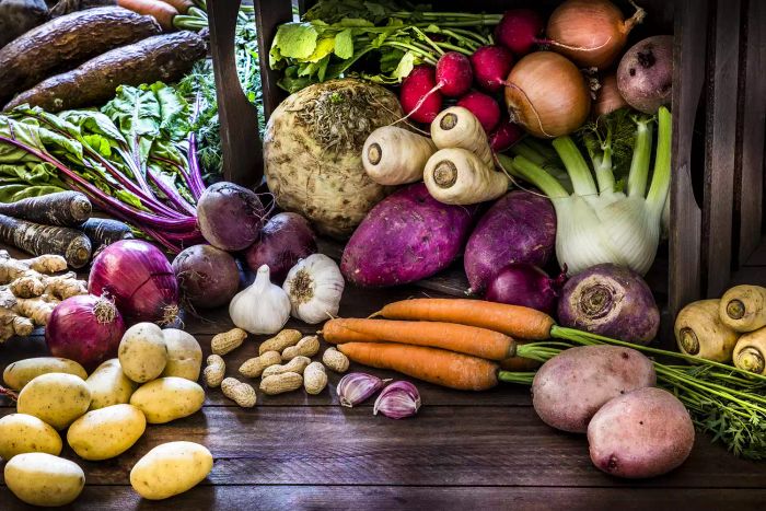 A variety of winter vegetables displayed on a table