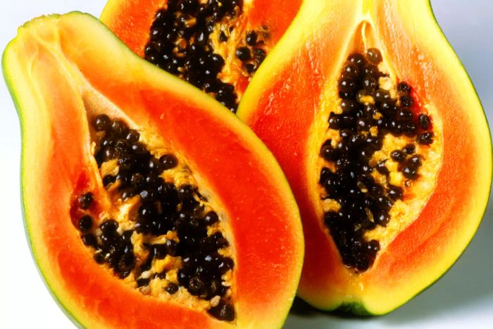 Halved papayas
