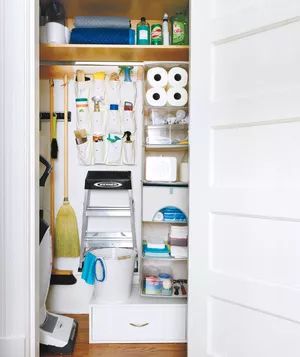 Efficient Utility Closet with Shelving and Hanging Storage Solutions
