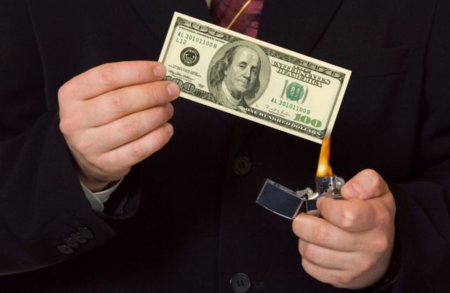 Man burning money