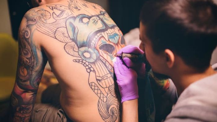 Tattoos may interfere with the body's natural sweating process.