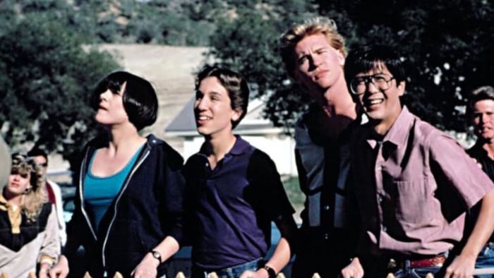 Michelle Meyrink, Gabriel Jarret, Val Kilmer, and Mark Kamiyama in Real Genius (1985).