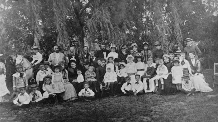 Alexander Graham Bell with educators and students at the Scott Circle School for deaf children in Washington, D.C.