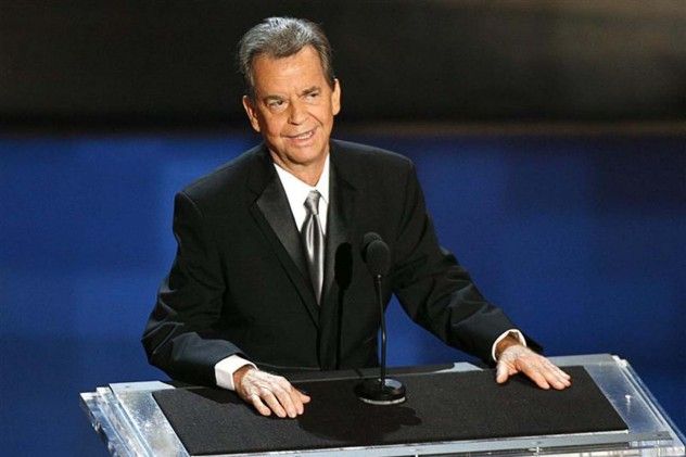 A photo of Clark standing onstage during a tribute to him at the 58th annual Primetime Emmy Awards in Los Angeles.