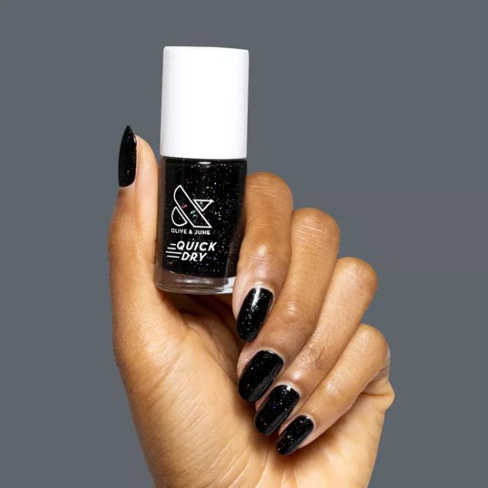Olive & June Quick Dry polish in glittery inky black