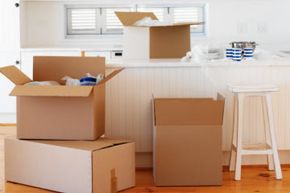 packing boxes in the kitchen