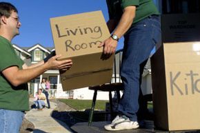 movers carrying boxes