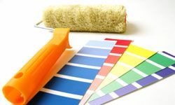 A paint swatch and a roller brush