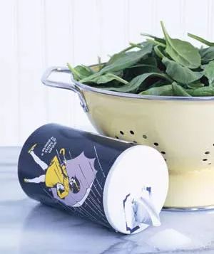 Morton salt and a bowl of spinach