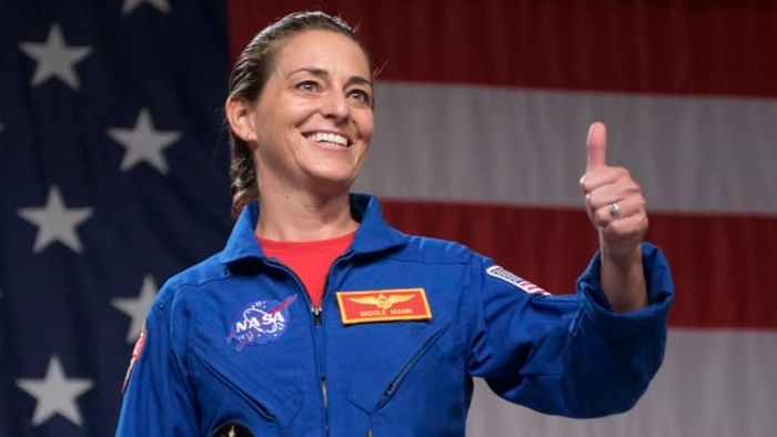 NASA astronaut Nicole Aunapu Mann speaks at an event in August 2018