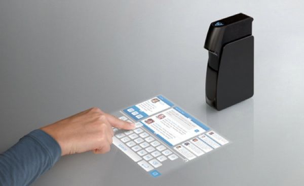 Light-Touch-Projector-Turns-A-Surface-Into-A-Touch-Screen1