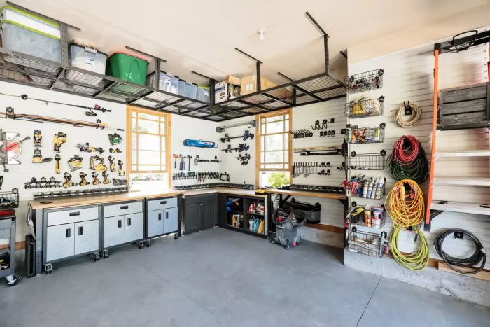 Wall Hooks and Hanging Storage Baskets in an Organized Garage