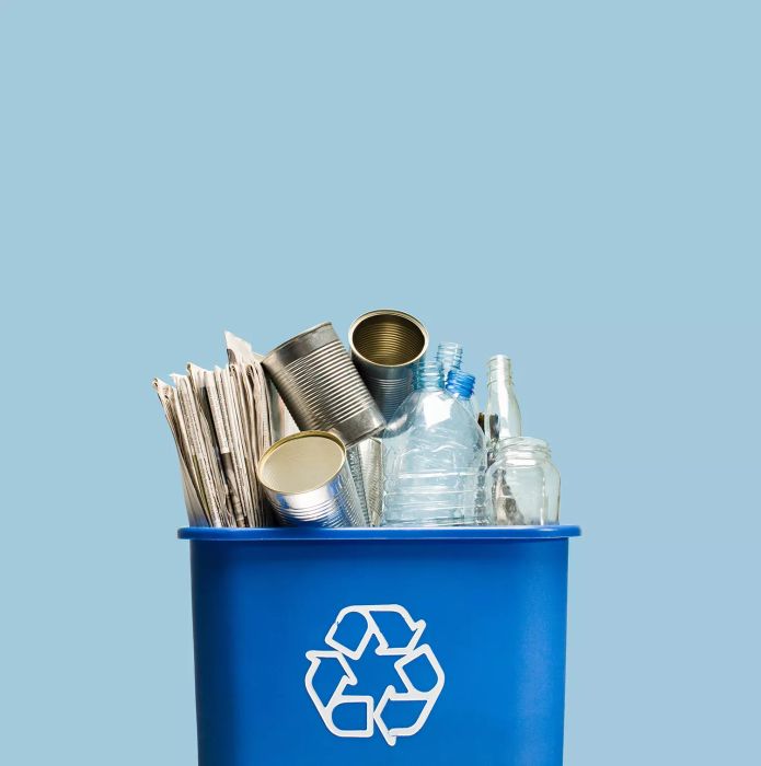 Overflowing recycling bin