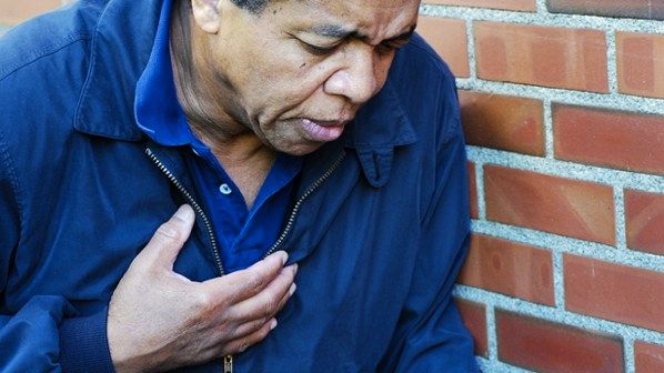 African-American-Male-Having-Chest-Pains-Via-Shutterstock