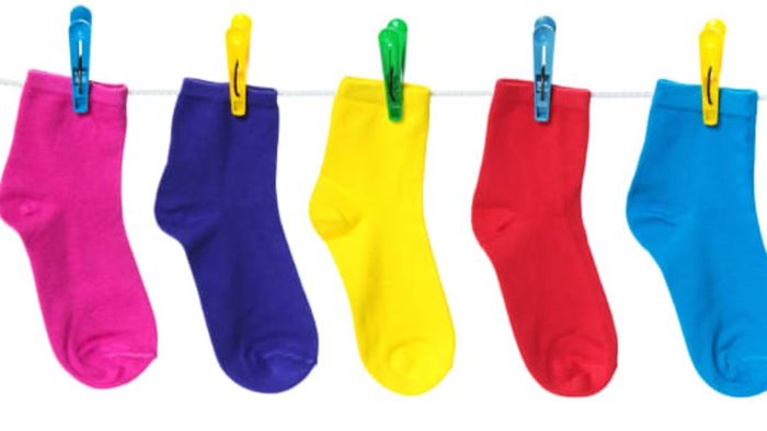 Socks hanging on a clothesline