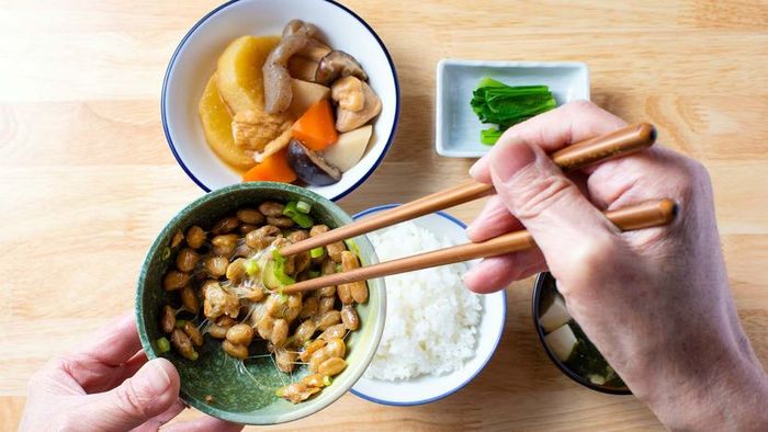 Natto is a traditional Japanese food made from steamed, fermented soybeans that’s typically served with white rice.