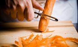 peeling carrots and vegetables