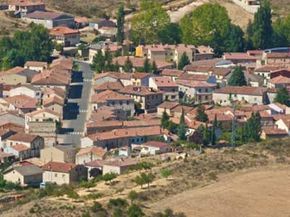 A charming Spanish town located in the southern plains of Burgos province, within the Ribera del Duero area.
