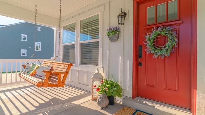 A cozy porch swing for your outdoor space.