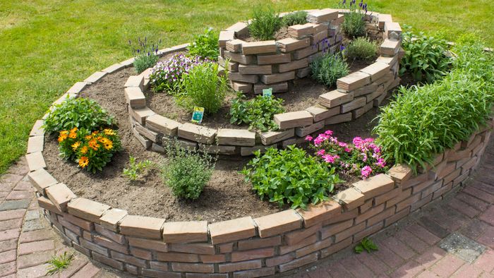 Herb spirals in the garden are a clever and space-saving way to grow your herbs.