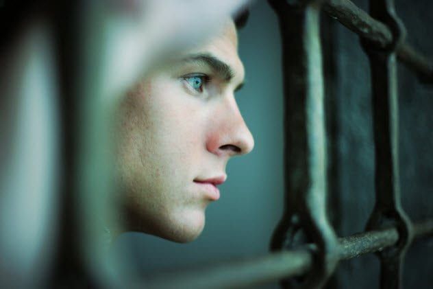 9b-smiling-young-prisoner-108150653