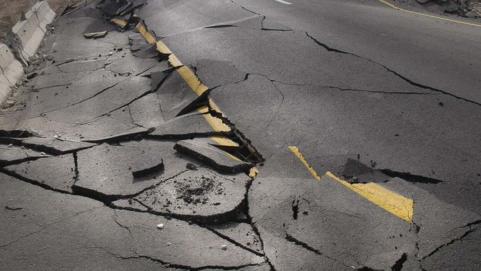 Cracked pavement after an earthquake