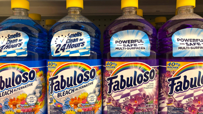 shelves stocked with bottles of Fabuloso cleaning products in a retail store