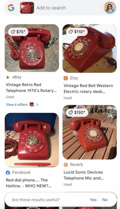 A grid featuring four red rotary telephones