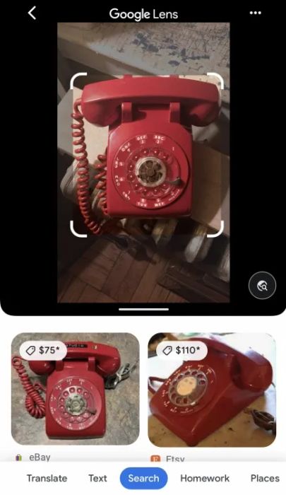 A red rotary telephone placed on a radiator
