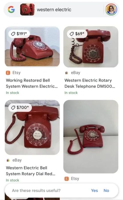 A grid displaying four red rotary telephones