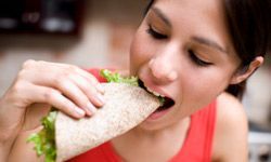 woman enjoying a wrap