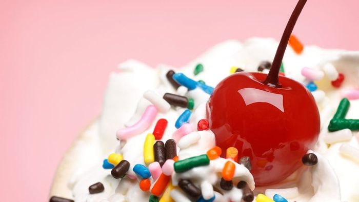 cherry atop a whipped cream sundae